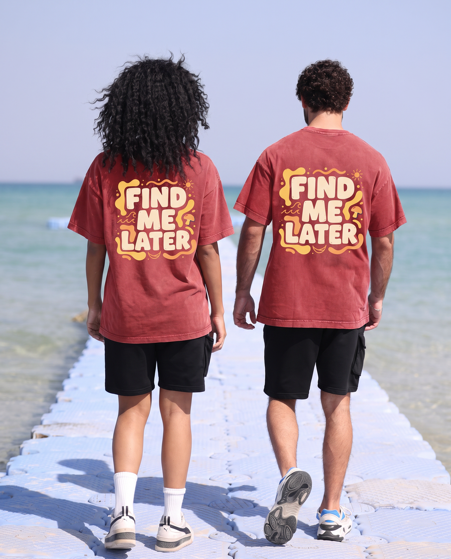 Find Me Later Tee — back view at beach