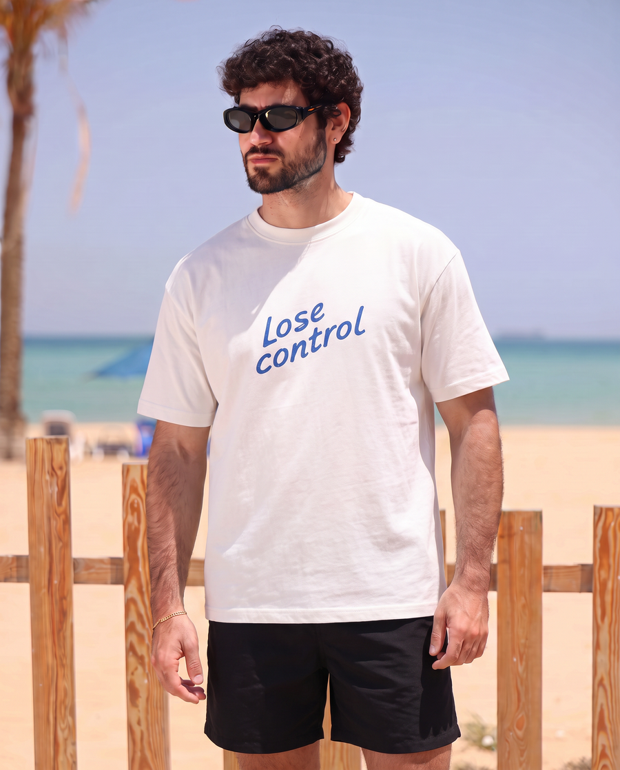Lose Control T-shirt — front view at beach