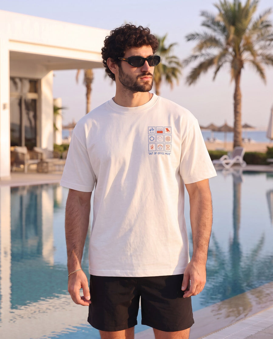 OUT OF OFFICE Tee — front view by pool